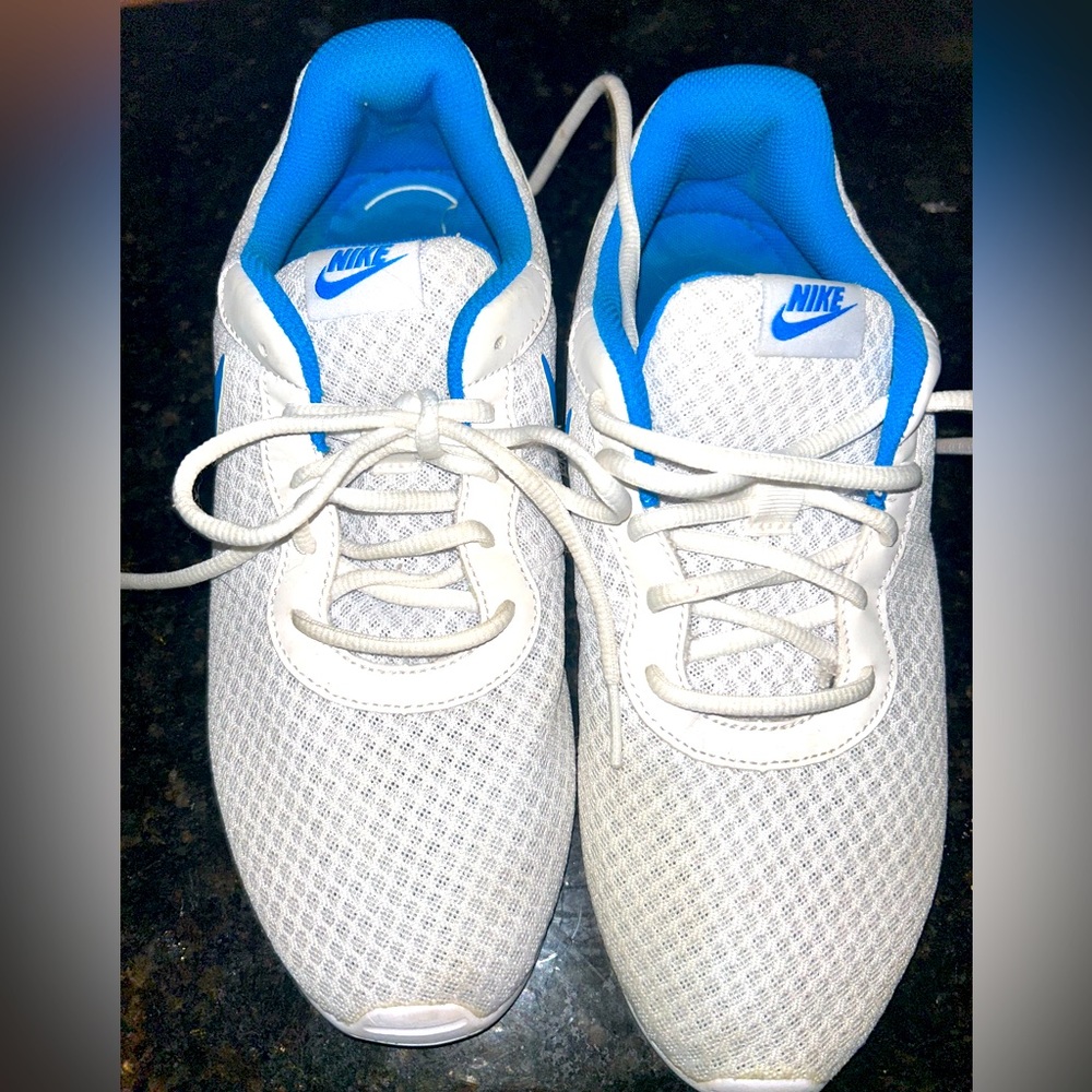 Nike mens white and blue athletic shoes. Size 9.5 very good condition.